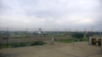 Weather camera view of AOC Auto Parts.