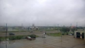 Weather camera view of AOC Auto Parts.