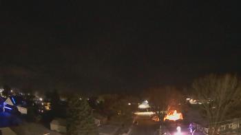 Weather camera view of Sibley East Middle and High School.