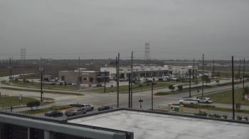 Weather camera view of Iowa Colony Police Department.
