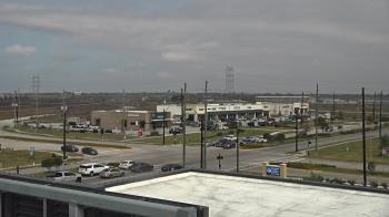 Weather camera view of Iowa Colony Police Department.