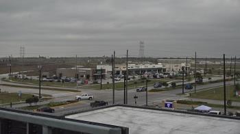 Weather camera view of Iowa Colony Police Department.