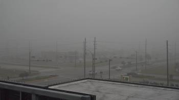 Weather camera view of Iowa Colony Police Department.