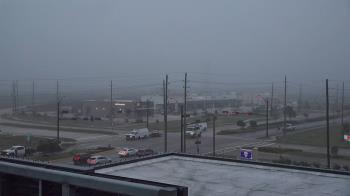 Weather camera view of Iowa Colony Police Department.