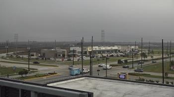 Weather camera view of Iowa Colony Police Department.