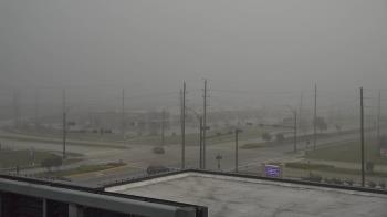 Weather camera view of Iowa Colony Police Department.