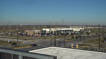 Weather camera view of Iowa Colony Police Department.