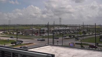 Weather camera view of Iowa Colony Police Department.