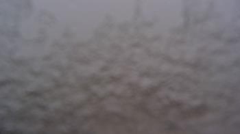 Weather camera view of County of Will.