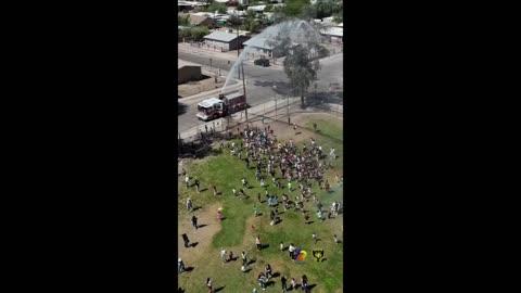 Firefighters Help Kids Cool Down