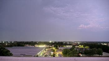 Weather camera view of Benchmark Group.