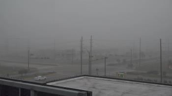 Weather camera view of Iowa Colony Police Department.