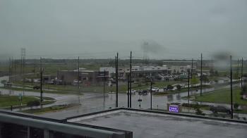 Weather camera view of Iowa Colony Police Department.