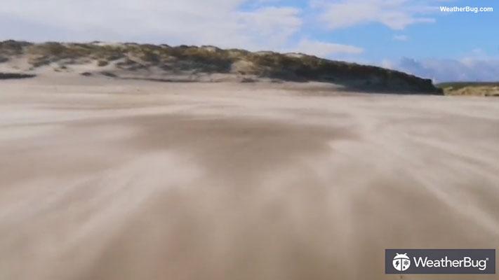 Sand flew across the beach near Cresswell, England, on February 17, ahead of Storm Eunice. (Saskia Wischnewski via Storyful)