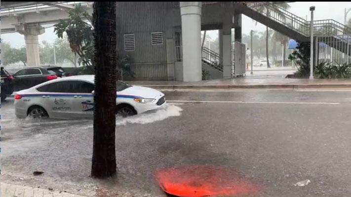 Heavy rain brought flash flooding to parts of Miami on April 10