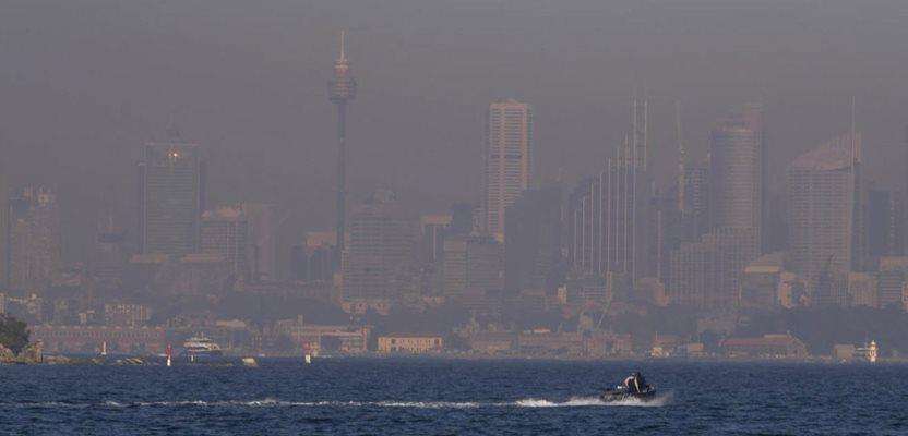 A thick blanket of smoke hangs over parts of Sydney following New South Wales Rural Fire Service (RFS) hazard reduction burns in the past week, Thursday, Sept. 14, 2023. (AP Photo/Mark Baker)