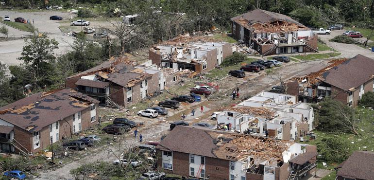 In this May 23, 2019 file. Photo, tornado damage is seen in Jefferson City, Mo. Eight years to the day after a devastating tornado killed 161 people in Joplin, another big twister ripped through another Missouri community, Jefferson City, but with a far different result: No deaths, no serious injuries. (Jeff Roberson, AP)