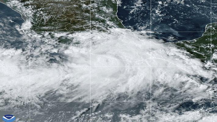 The National Oceanic and Atmospheric Administration satellite image taken at 6:10pm ET shows Hurricane John near southern Mexico on Monday, Sept. 23, 2024. (NOAA via AP)