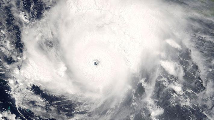 The Terra satellite captures imagery of Category 4 Hurricane Emily south of Jamaica on July 16, 2005 (Wikimedia Commons/NASA/Jeff Schmaltz, MODIS Rapid Response team).