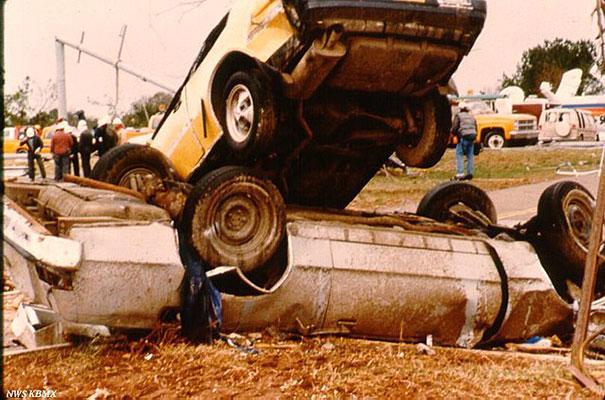 The November 15, 1989 Huntsville tornado piled cars atop another, tore down high-voltage power lines to the city, and drew news crews with their satellite uplink trucks. Photographed by NWS Birmingham during their storm survey (NWS/Wikimedia Commons).