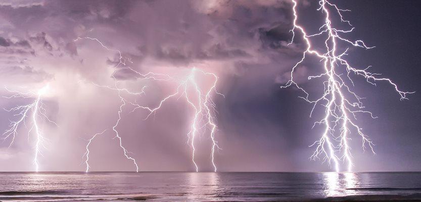 Fire at sea Lightning Storm (Shane Ocean via Shutterstock).