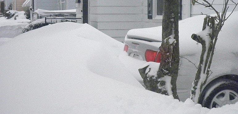 A snowdrift after a big snowstorm in Wisconsin. (Wikimedia Commons)