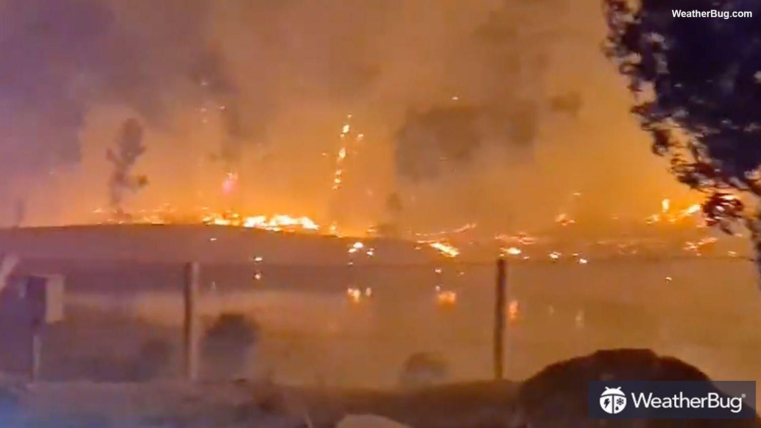 Footage shared by the Rockingham Volunteer Fire & Rescue Service show sparks flying as strong winds carried flames (RockinghamVFRS via Storyful).