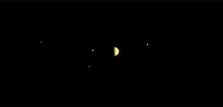 Screen capture of Juno time lapse of Jupiter and its moons