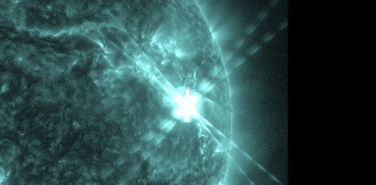 This photo provided by NASA’s Solar Dynamics Observatory captured this image of a solar flare, as seen in the bright flash in the upper right, on Thursday, Dec. 14, 2023. The sun spit out the huge flare at noon on Thursday, resulting in two hours of radio interference in the U.S. and other sunlit parts of the world. (NASA via AP)