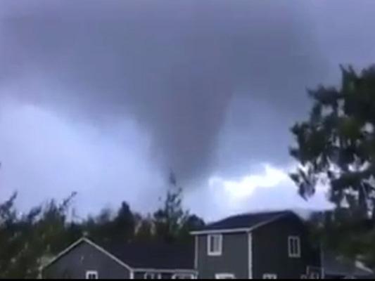 A tornado can be seen making its way through Manzanita, Ore., Friday, October 14, 2016. (Courtesy of Facebook/Julee Ward via Storyful)
