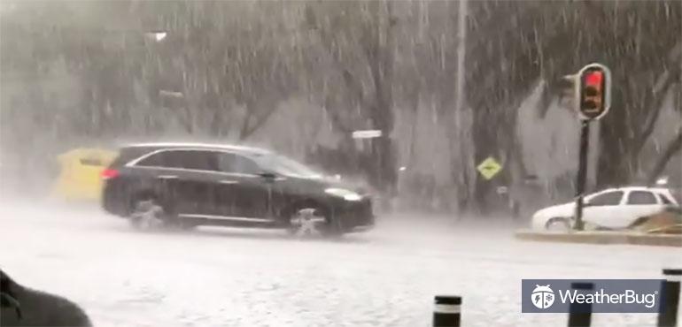Large hail covering a road in Mexico City.