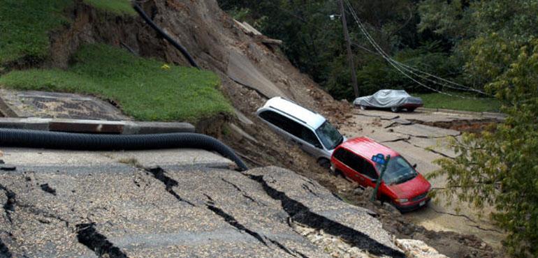 This section of E. Grace Street, Richmond, VA, collapsed during tropical storm Gaston. (Liz Roll, FEMA Photo Library via Wikimedia Commons; August, 31, 2006)