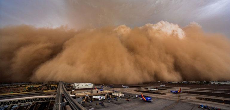 Large wall of dust approaching Phoenix Sky Harbor Airport at around 5:30 PM MST (Photo credit: Mike Olbinski via NWS)