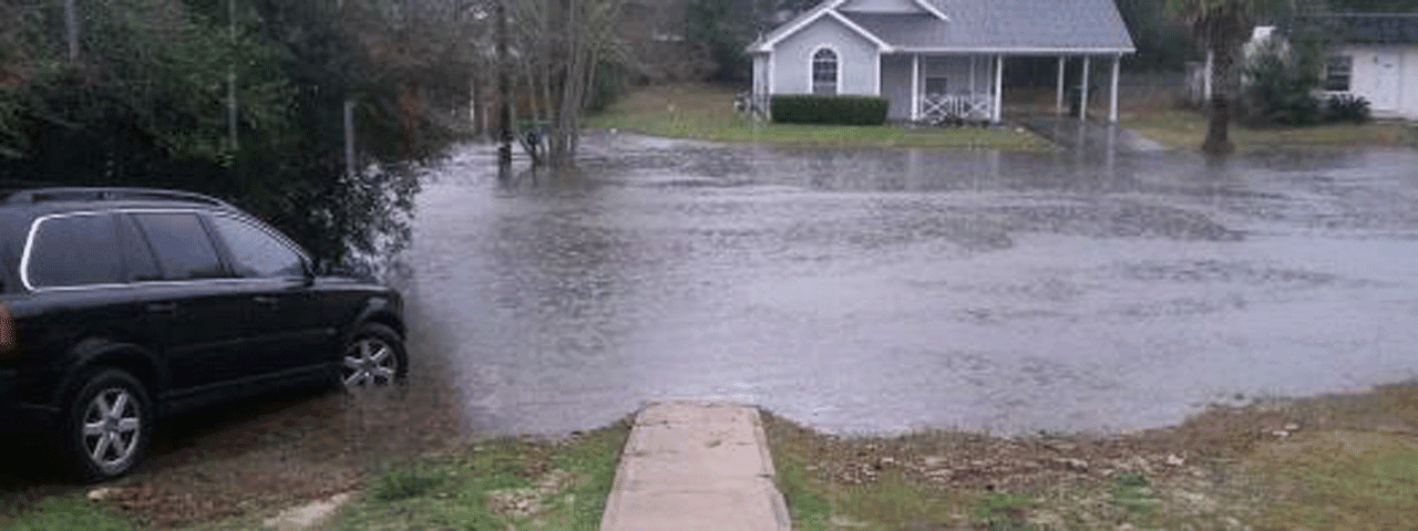 Heavy rain produces flooding on Sunset Boulevard in Fort Walton Beach, Fla., in early February 2016.