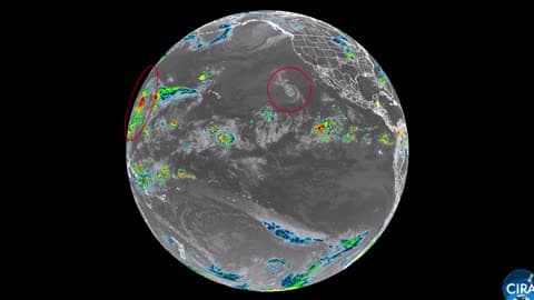 Tropical Cyclones Swirl in Pacific Ocean