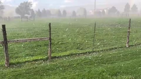 Rainbow Shines Through Hailstorm Pelting Salt Lake City Area