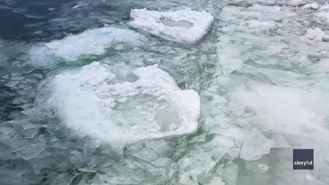 Mesmerizing Blue Ice Forms on Lake Michigan