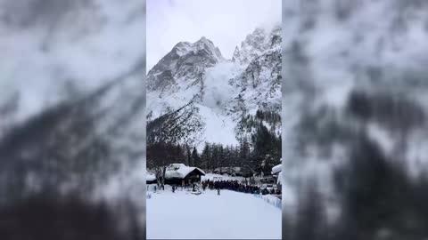 Wall of Snow Swallows Skiers During Avalanche