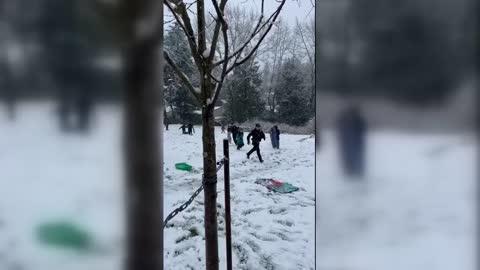 Police Take On Local Kids in Snowball Fight