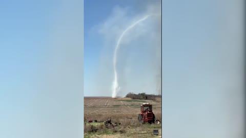 Smoke Whirl Towers Over Rural Kansas