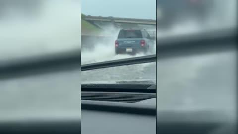 Motorists Battle Flooded Roadways