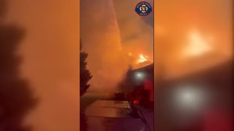 Flames Rage on Roof as Fires Rip Through Spokane