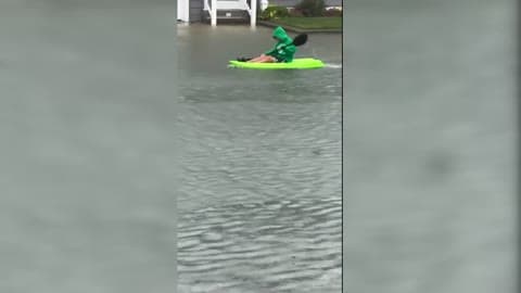 Duo Kayak Down Flooded Jersey Shore Street